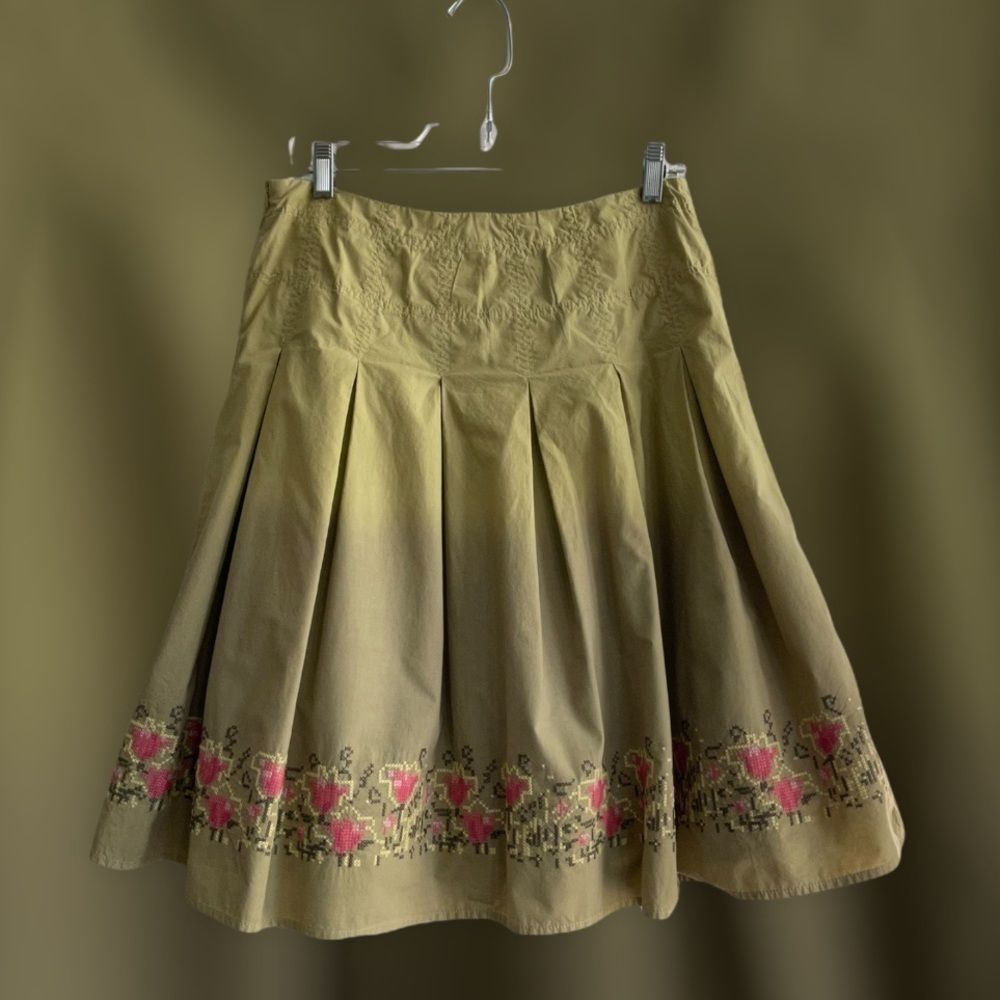 Green gradient skirt with cross stitching